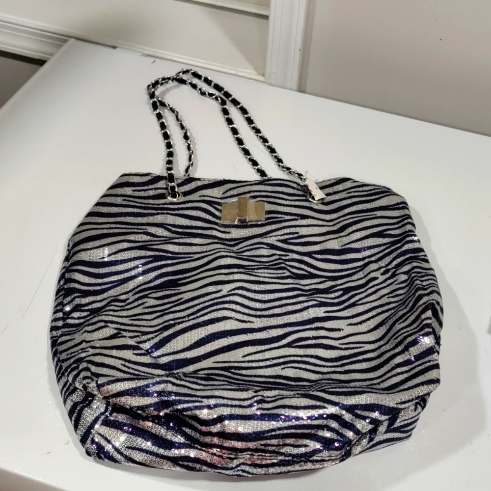 New- blue/silver sequin bag with black/silver straps.